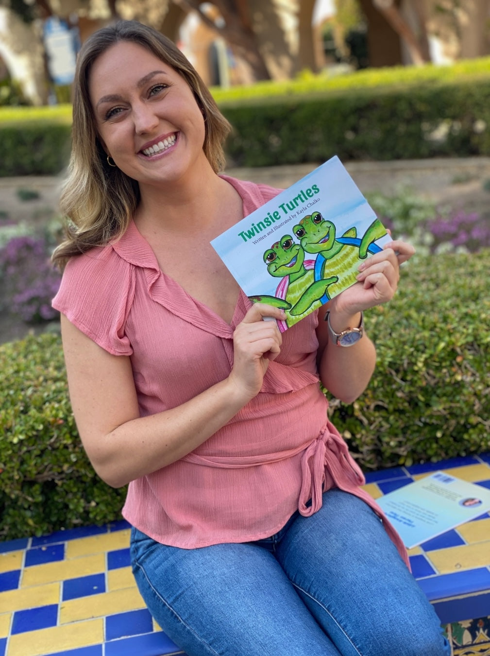 kayla holding book
